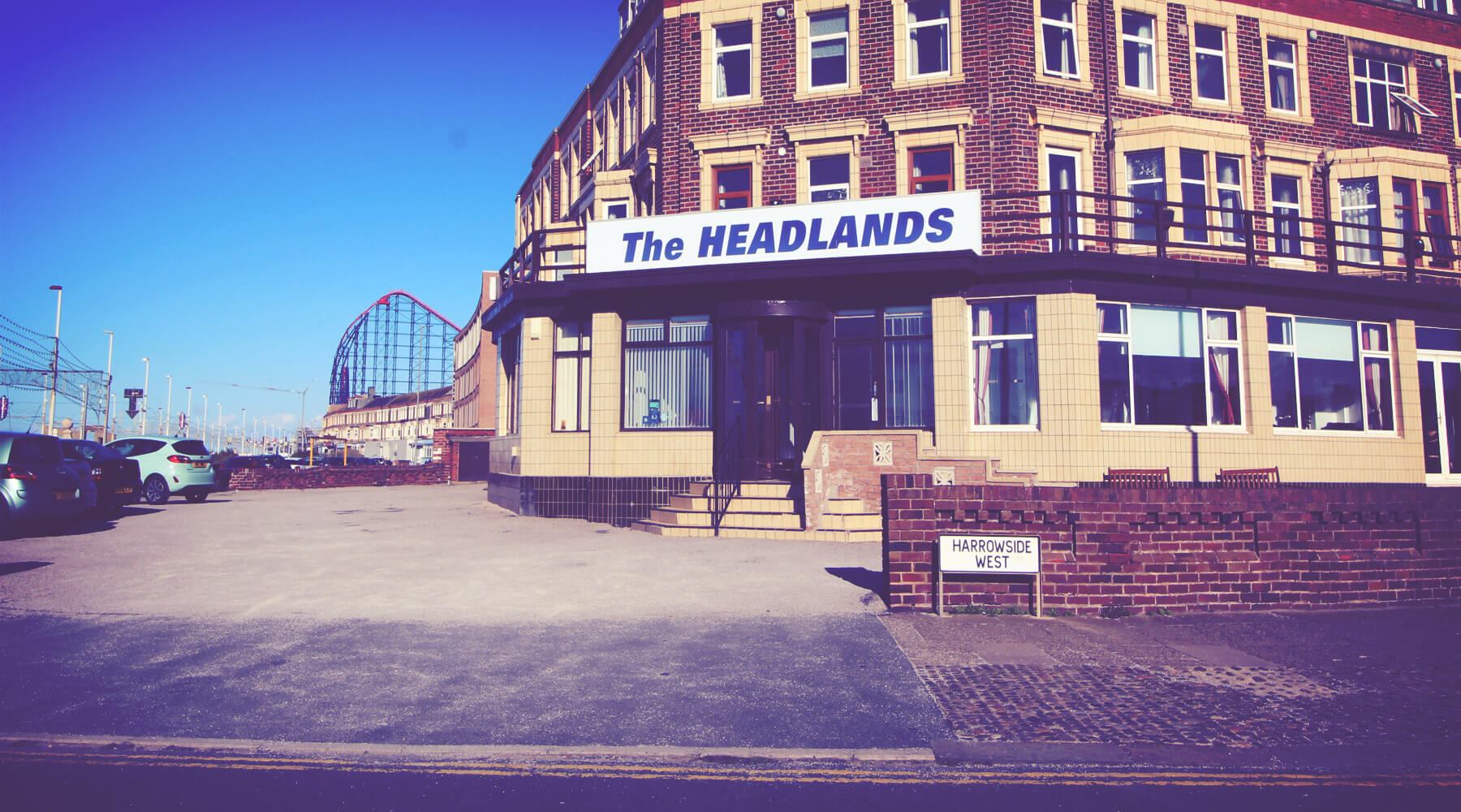 The Headlands Hotel on New South Promenade, Blackpool — with the Pleasure Beach behind